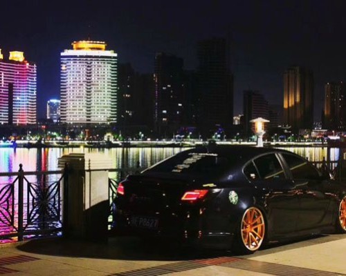 Orange wheels Buick Regal bagriders perfect match