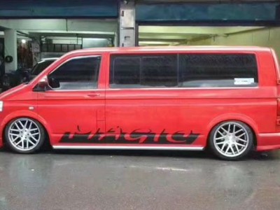 Fire red Volkswagen Multivan bagriders MPV low lying wind